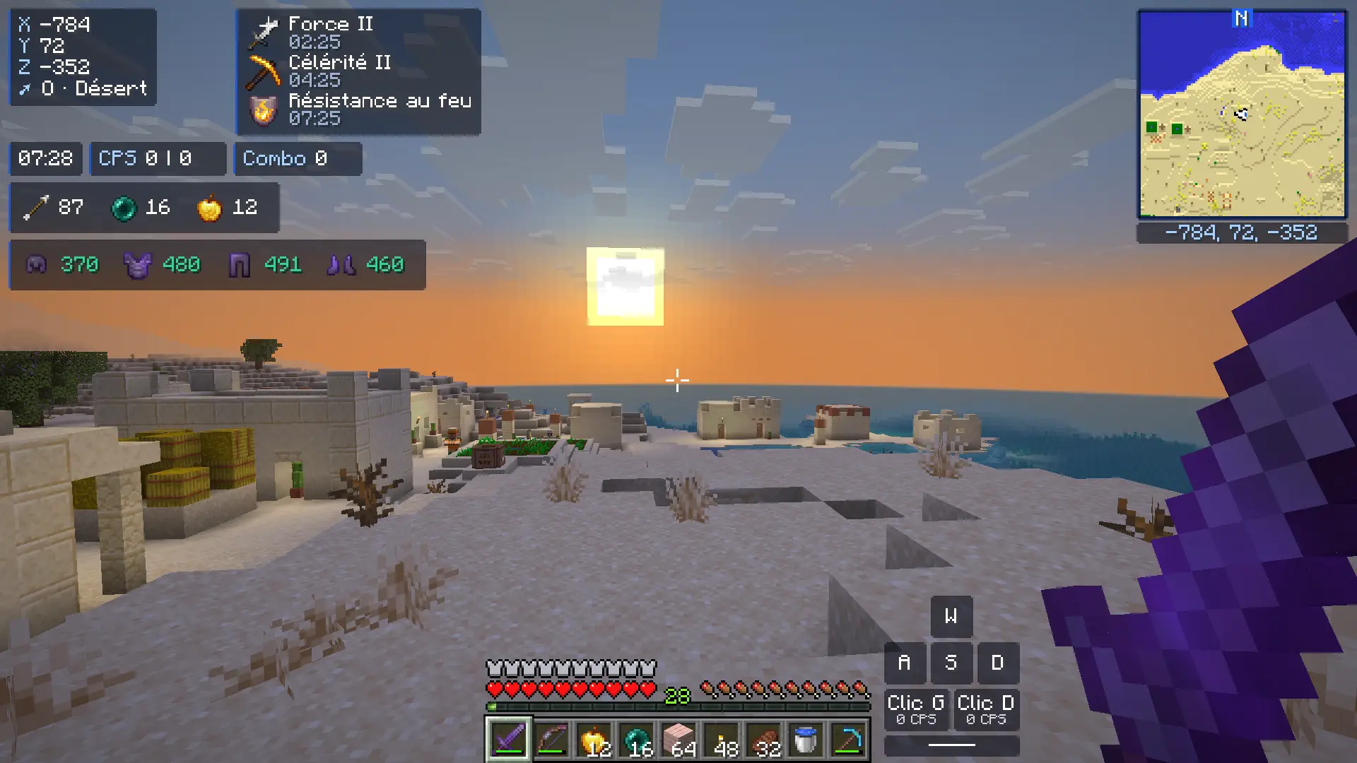 Desert village by the sea at sunset, with the OkaClient HUD